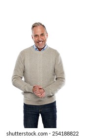 Portrait Of Happy Middle Aged Man Standing On White Background