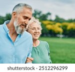 Portrait of a happy middle aged woman and  active middle aged white couple having fun walking holding hands and bonding in park outdoors