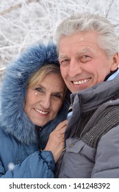 Portrait Of A Happy Middle-aged Couple On A Walk In Winter