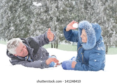 Portrait Of A Happy Middle-aged Couple On A Walk In Winter