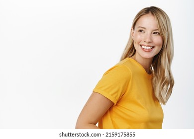 Portrait of happy modern woman, beautiful girl with white smile, bloind hair and clear natural skin without makeup, standing over white background - Shutterstock ID 2159175855