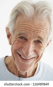 Portrait Of Happy Old Man Isolated Over White Background