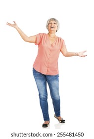Portrait of a happy old woman with both arms open, with copyspace for the designer
