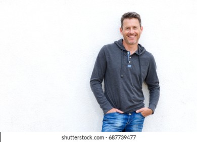 Portrait Of Happy Older Man Standing Isolated On White Background