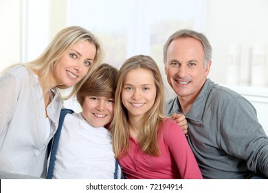 Portrait Of Happy Parents And Children