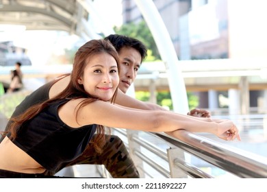 Portrait Of Happy Partner Buddy Runner Man And Woman Lover Smiling During Resting After Exercise Run Outdoor, Partner Buddy Runner Jogger Athlete Training And Doing Workout In Downtown City.