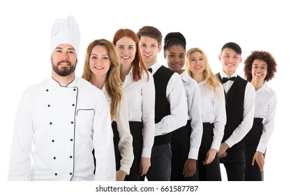 Portrait Of Happy Restaurant Staff Standing In Row