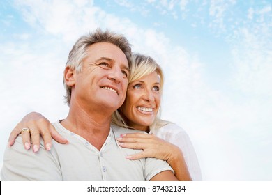 Portrait of a happy romantic couple outdoors.