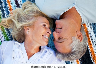 Portrait of a happy romantic couple outdoors.