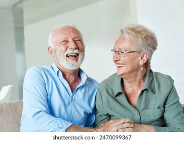 Portrait of a happy senior couple embracing hugging and having fun at home - Powered by Shutterstock