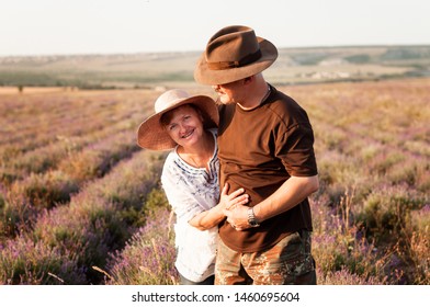 Portrait of happy senior couple in hat on a lavender field
 - Powered by Shutterstock