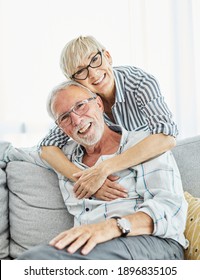 Portrait Of A Happy Senior Couple At Home