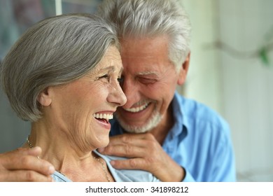 Portrait Of A Happy Senior Couple At Home