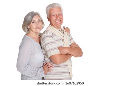 Portrait Of Happy Senior Couple Hugging Isolated On White Background