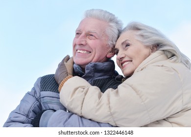 Portrait Of Happy Senior Couple At Winter Outdoors