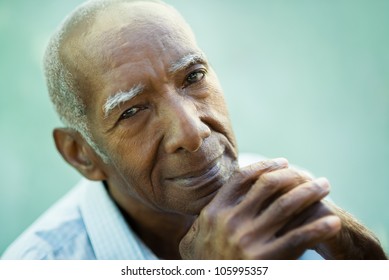 Portrait Of Happy Senior Hispanic Man Looking At Camera And Smiling. Close-up Of Face, Copy Space