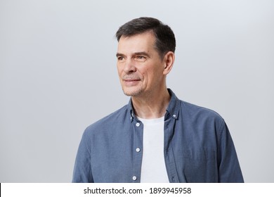 Portrait Of  Happy Senior With  Smart Casual, Real People Studio Shot With Copy Space On Gray Background.