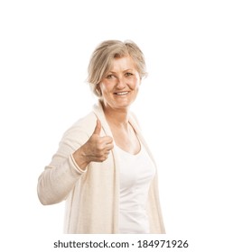 Portrait of a happy senior womanwith thumbs up isolated on white background