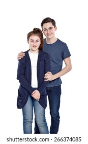 Portrait of happy siblings standing together on white background