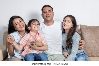 Portrait of happy small indian  family 