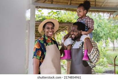 Portrait Of Happy Sme Owner Black African American Farmer Family Working In Barn Farm, Worker Planting In Organic Nersery, Startup Small Business Owner, Lifestyle Mother Father Farmer Job Concept