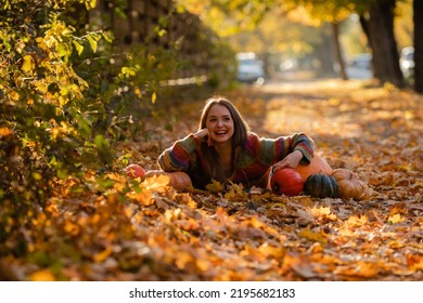 Portrait Of Happy Smile Woman With Pumpkins In Hand.