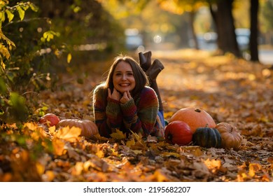 Portrait Of Happy Smile Woman With Pumpkins In Hand.