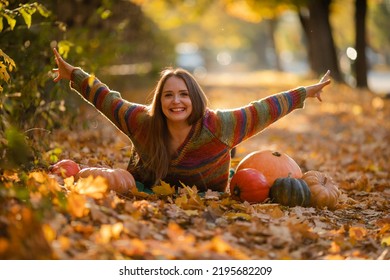 Portrait Of Happy Smile Woman With Pumpkins In Hand.