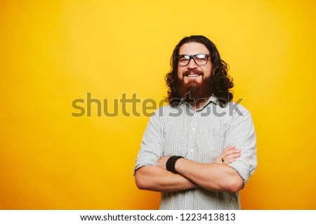 Portrait of happy smiling bearded hipster man in casual