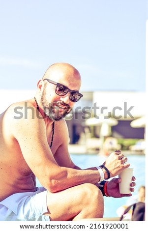 Similar – Glücklicher Mann mit Sonnenbrille lacht bei der Sommerparty.