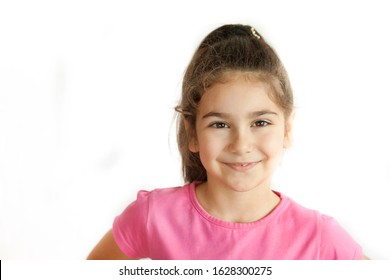 Portrait Of Happy Smiling Child Girl Isolated On White Background. Laughing People. Positive Emotions.