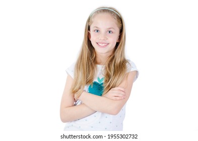 Portrait of happy smiling child girl with folded hand. Casual little girl. Isolated on white background
