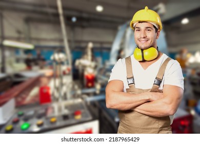 Portrait Of Happy Smiling Industrial Worer With Safety Helmet, Concept Of Safety Measures, Skilled Labour And Workforce.