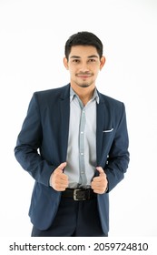 Portrait Of Happy Smiling Young Asian Businessman In Smart Casual Attire On Isolated White Background. Studio Shot, Business And Success Concept