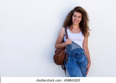 Portrait Of Happy Teen Student With Backpack Isolated On White