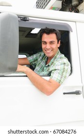 Portrait Of A Happy Truck Driver