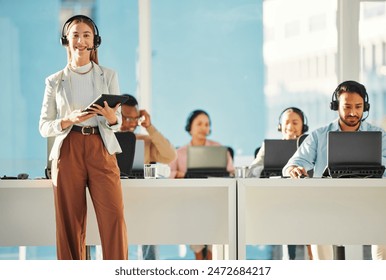 Portrait of happy woman, call center or team leader with tablet in customer service or telemarketing. Contact, sales or consultant agent coworking with smile or technology for online tech support - Powered by Shutterstock