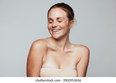 Portrait Of A Happy Woman. Close Up Of Woman With Freckles On Body In Cheerful Mood.