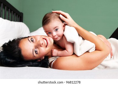 Portrait Of Happy Woman With Her Baby