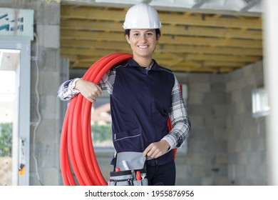 Portrait Of A Happy Woman Plumber