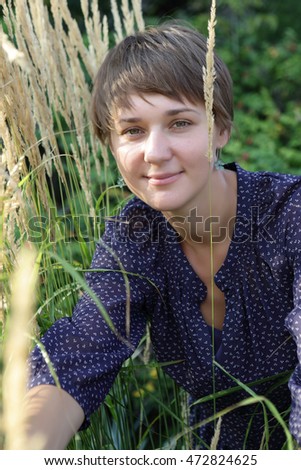 Similar – Foto Bild Junge Frau sitzend im Wald.