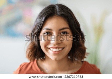 Portrait Of Happy Young Beautiful Arab Woman Smiling At Camera, Closeup Shot Of Cheerful Millennial Middle Eastern Female With Dark Hair And Natural Makeup Expressing Positive Emotions, Copy Space