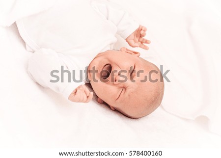 Similar – Newborn baby girl sleeping on blue sheets at home