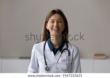 Similar – Pretty female doctor in a geriatric clinic with elderly woman in wheelchair