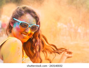 Portrait Of Happy Young Girl On Holi Color Festival