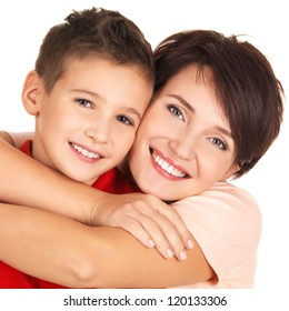 Portrait of a happy young mother with son 8 year old over white background