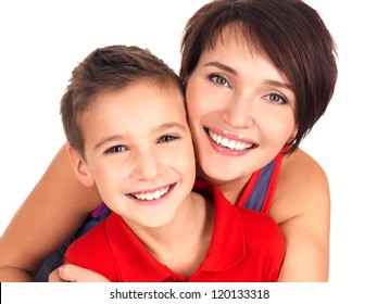 Portrait of a happy young mother with son 8 year old over white background