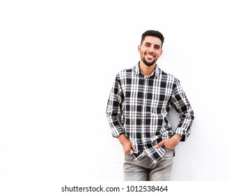 Portrait Of Happy Young North African Man Smiling Against White Background