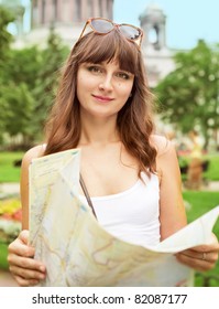 Portrait Of Happy Young Tourist Girl With The Map In St. Petersburg