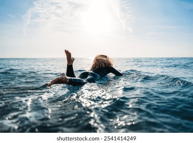 Portrait of happy young woman, girl with surfboard, smiling and enjoying holiday and water sports - Powered by Shutterstock